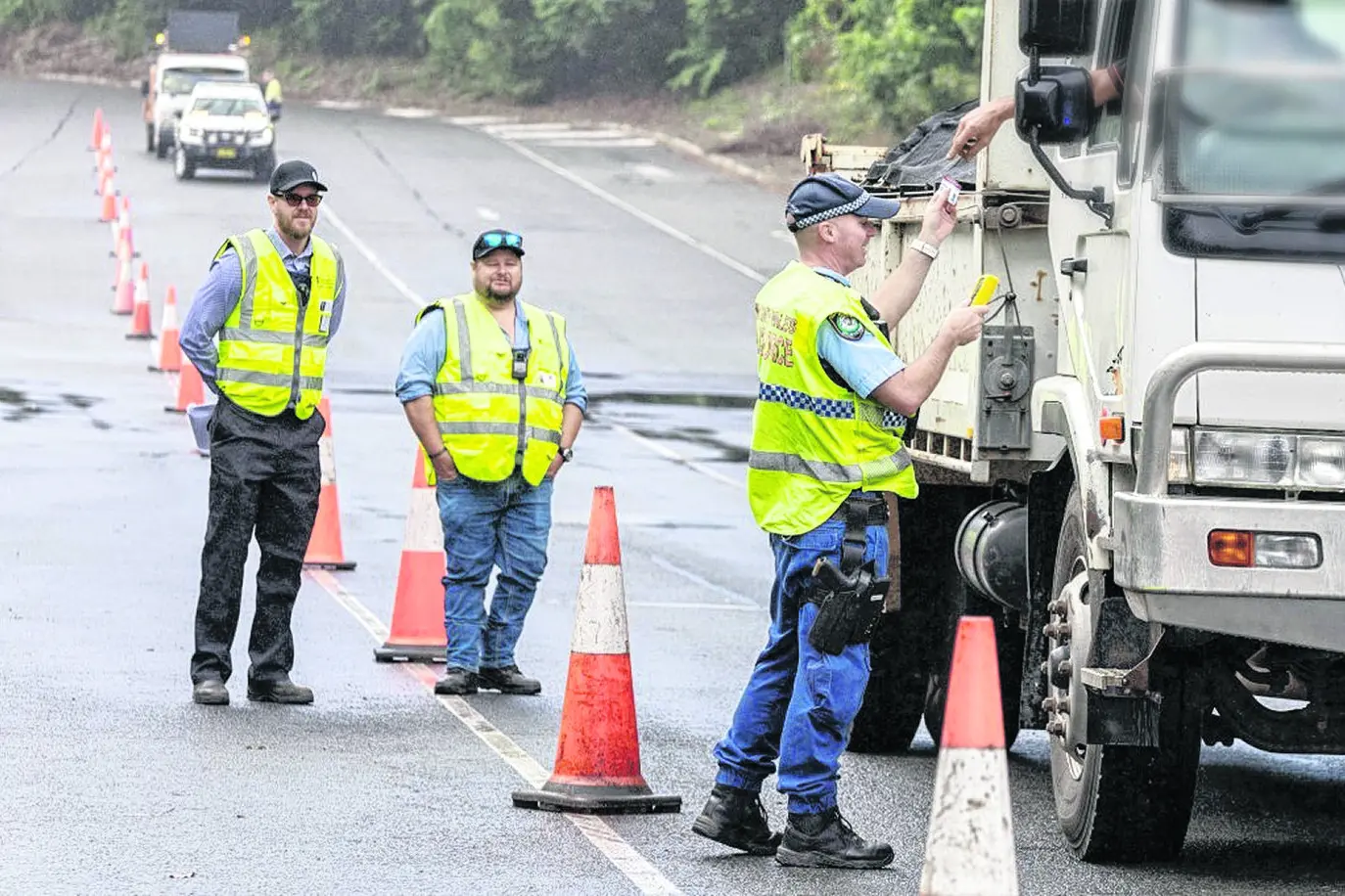 Teams from NSW Police, Heavy Vehicle Regulation Authority and Department of Primary Industries and Regional Development are currently undertaking random compliance checks of heavy vehicles entering NSW from Queensland to stop the spread of the invasive red fire ants. Photo: Supplied