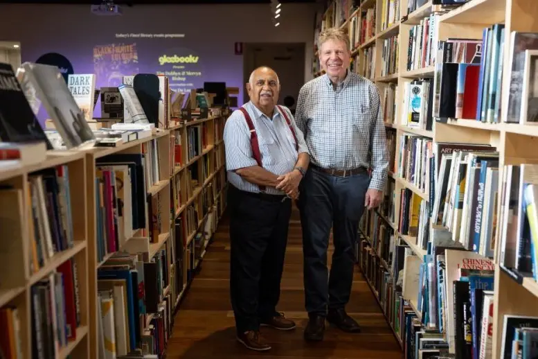 Australia\\'s first Indigenous press photographer Merv Bishop (left) is the subject of a new book written by journalist and long-time friend Tim Dobbyn (right). Photo: AAP/Sitthixay Ditthavong