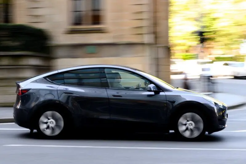 Australians bought 12,076 new electric cars during September - 11.3 per cent of all new vehicles. Photo: AAP/Steven Markham