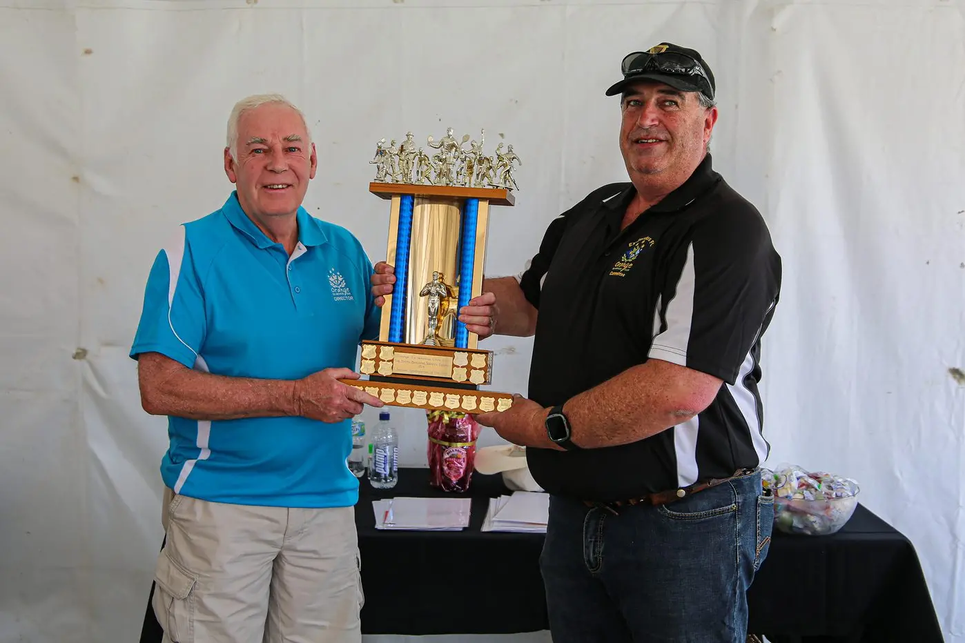 Junior Sports Person of the Year \\u2014 OESC Director Terry Flood with OESC Soccer Club Committee Member Brett Kerruish, accepting the award on behalf of Max Pearson