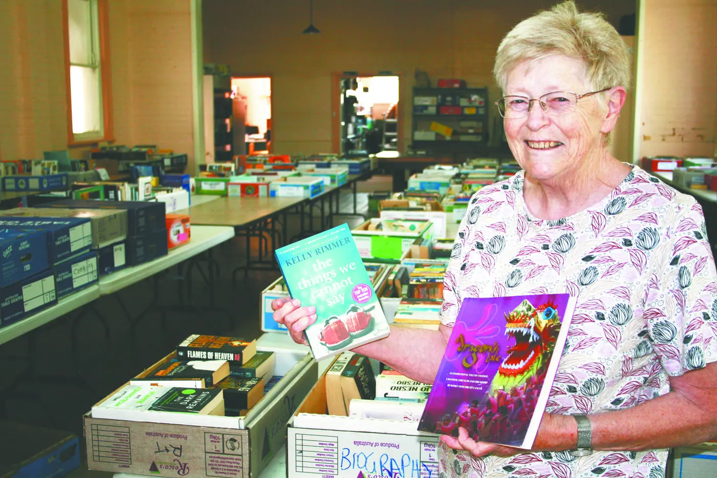 Blayney Anglican Parish Book Fair volunteer, Janet Power; the call has gone-out for good-quality publications, plus DVDs, CDs, albums, and board games, for the annual Book Fair. Photo: David Dixon