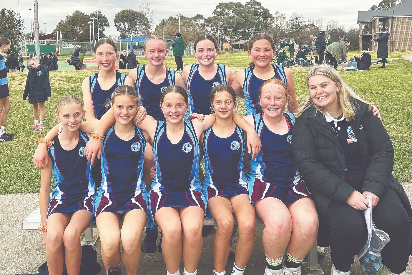 The St Mary\\u2019s Blue side included: Back row (l-r): Emily Maher, Elwyn Evans, Indiella Carter, Hannah Sara. Front row (l-r): Aaliyah Haynes, Bonnie Venner, Bree Collins, Lucy Zarrella, Pippi Jarrick and Miss Erin Holmes (teacher/coach).
