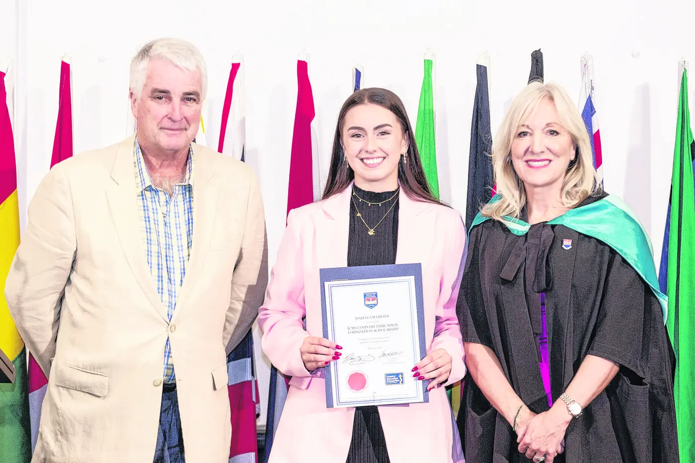 Isabella Webster received a scholarship last year, backed by the Country Education Foundation of Orange and District, helping her start full-time studies in event management in Sydney. She\\'s pictured, centre, with CEF board member Dougla Geddes, ICMS Scholarships Chair Ann Whitelock. Photo: Supplied.
