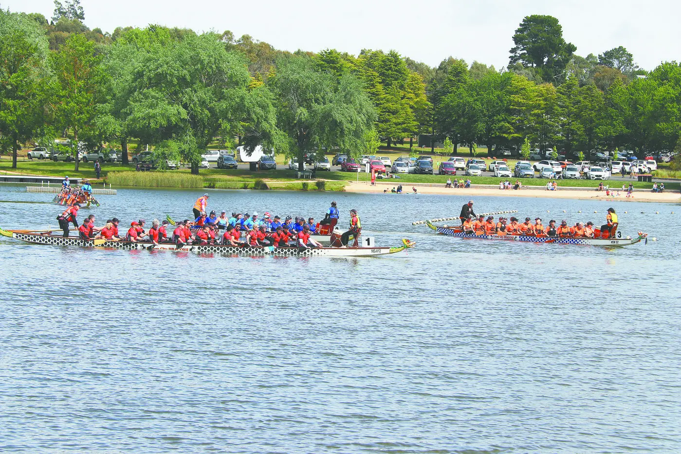 Some of the action at the Western Region Dragon Boat Regatta at Lake Canobolas on Sunday, November 3. One of the Colour City Dragons teams (1) is at left in both these images. Photo: Rodney Watters.