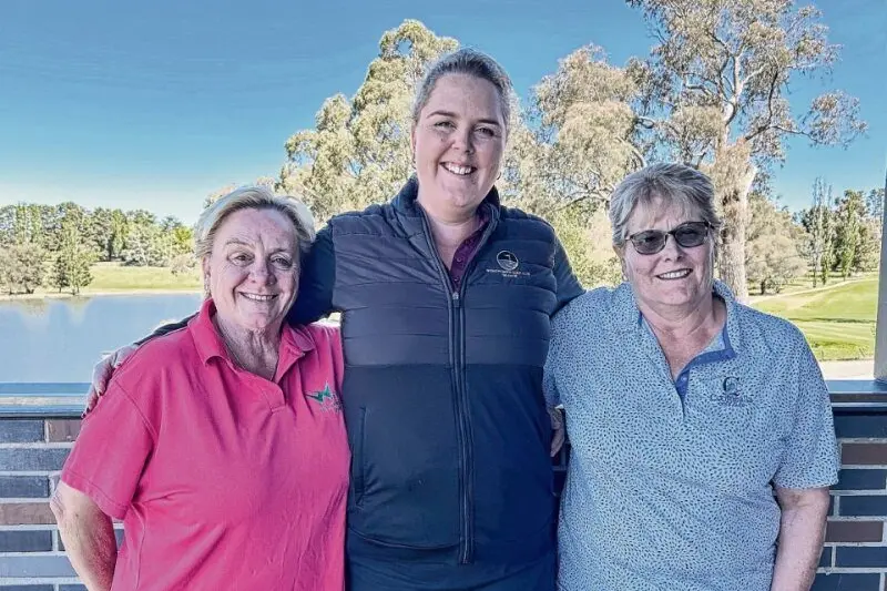 Scratch winners: Helen Ross and Shirley Grenfell with Captain Tayla Harvey, centre.