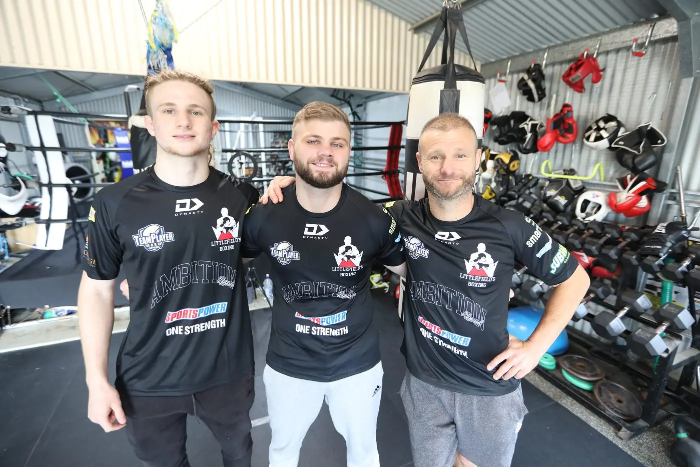 Finn, Jack and Dave Littlefield in their home gym.