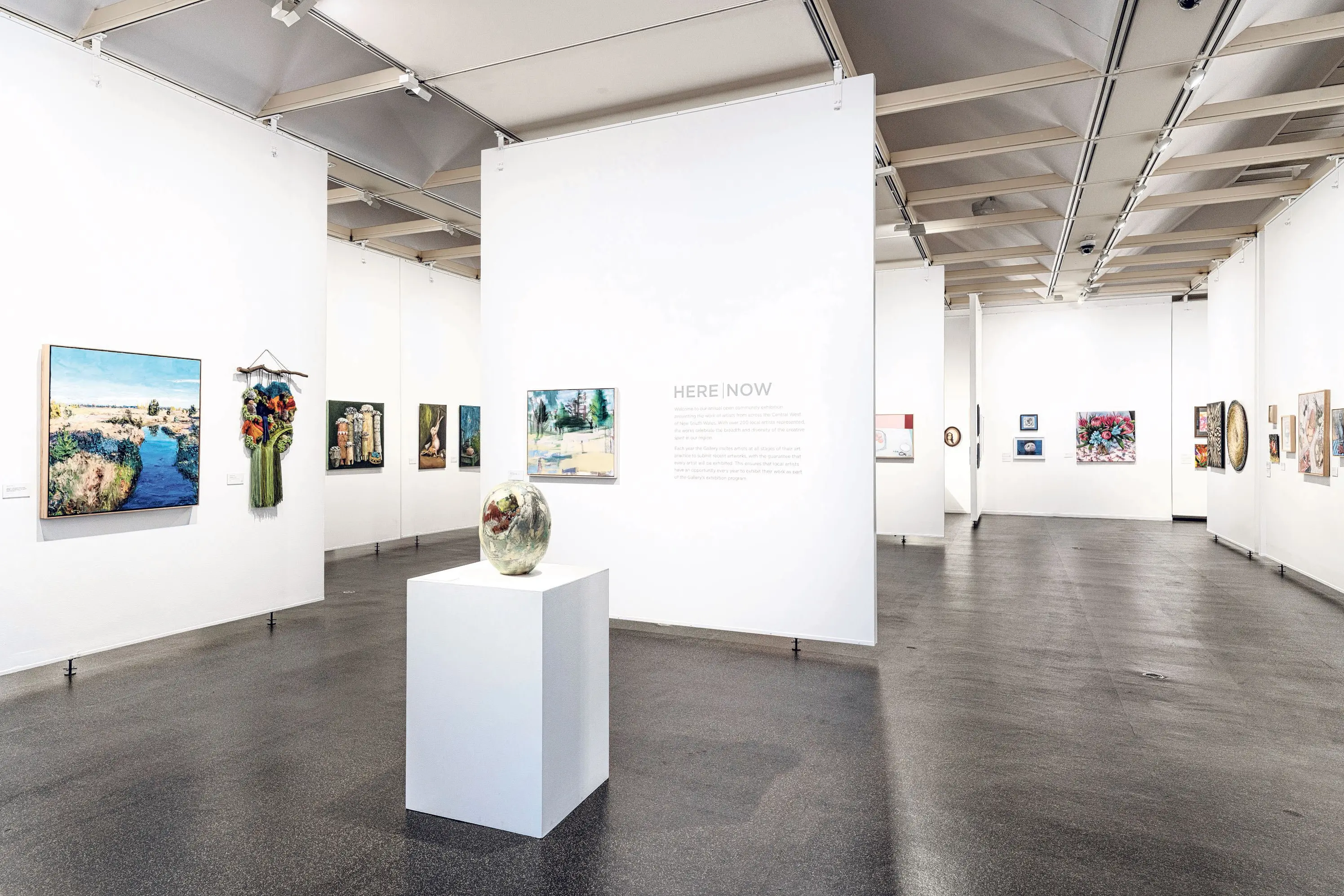 <p>Image caption: Installation view of Here/Now. Photograph by John Daly, 2025</p>\\n