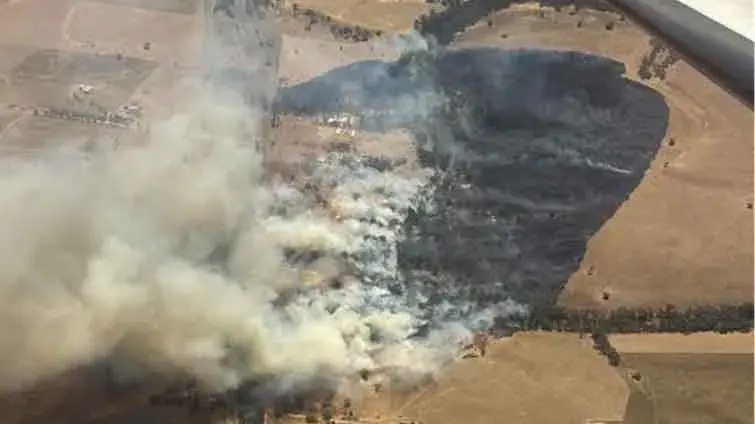 Persistent heatwave conditions fuel bushfire threat, as warning for Beni Road downgraded