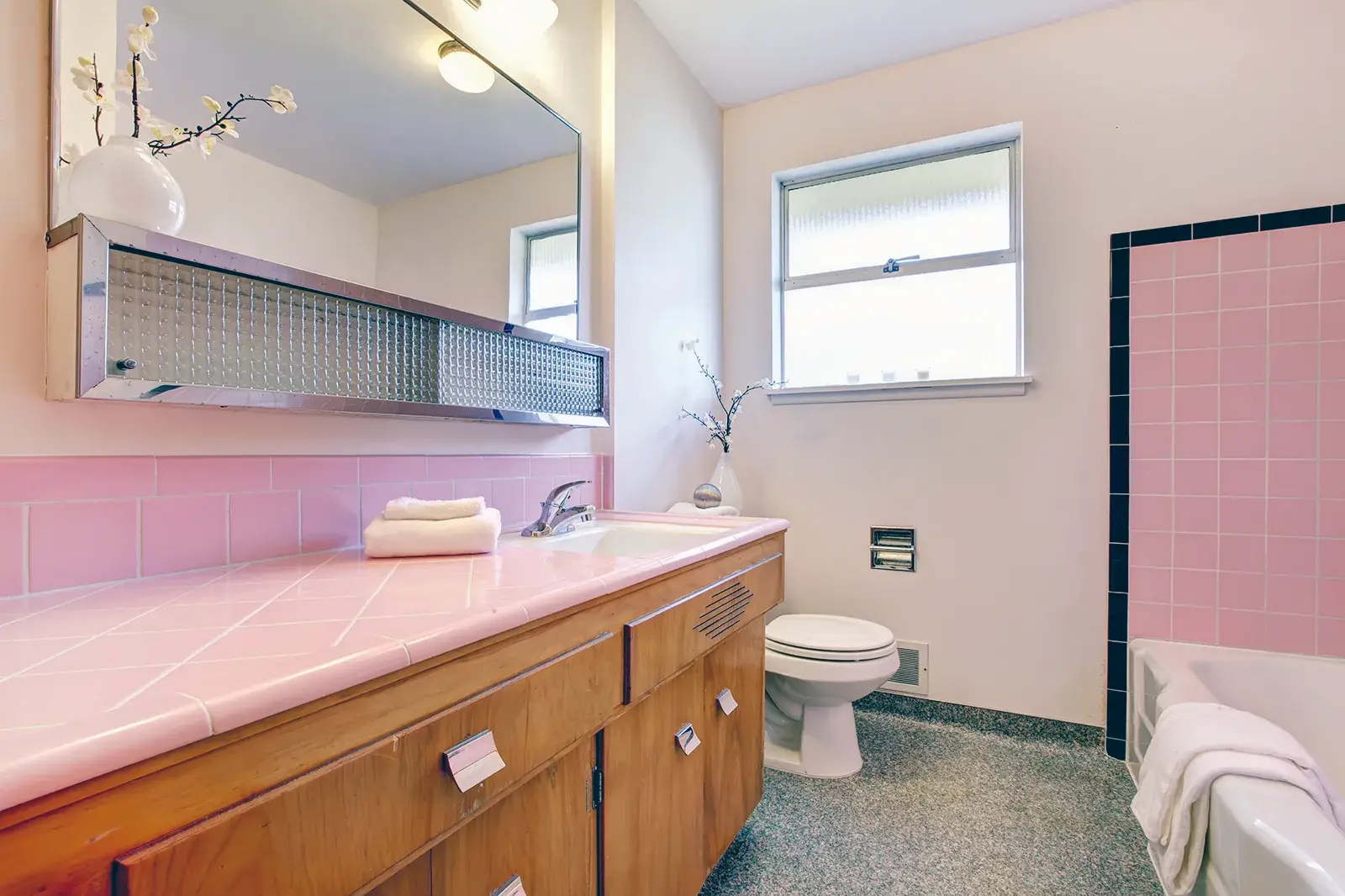 <p>A dated bathroom or kitchen is one of the common factors that can impact home values.</p>\\n