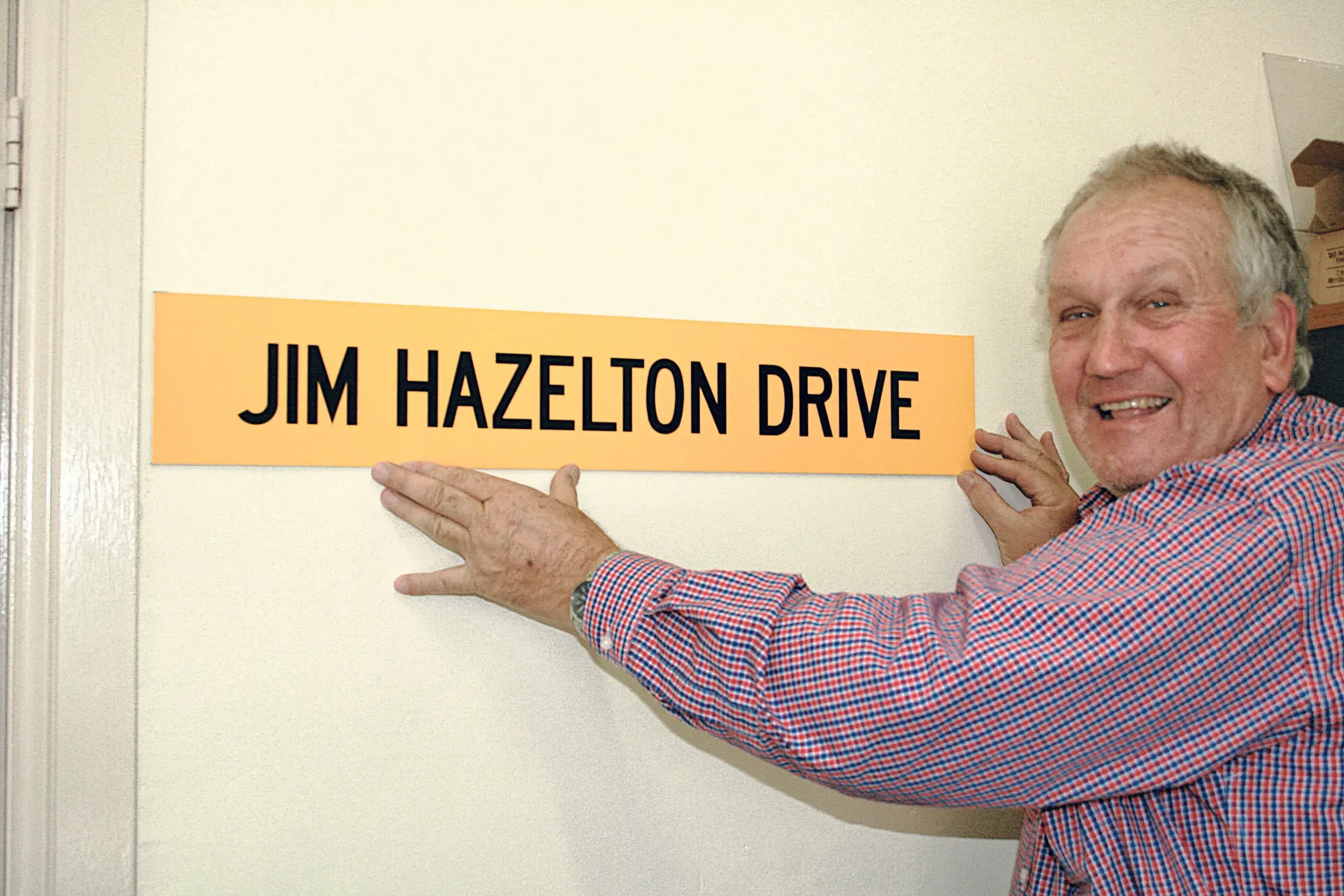 <p>Wade Mahlo is a happy man, with local aviation pioneer Jim Hazelton to be remembered with the road into Orange Airport to be named in his honour. Photo: Orange City Life.</p>\\n