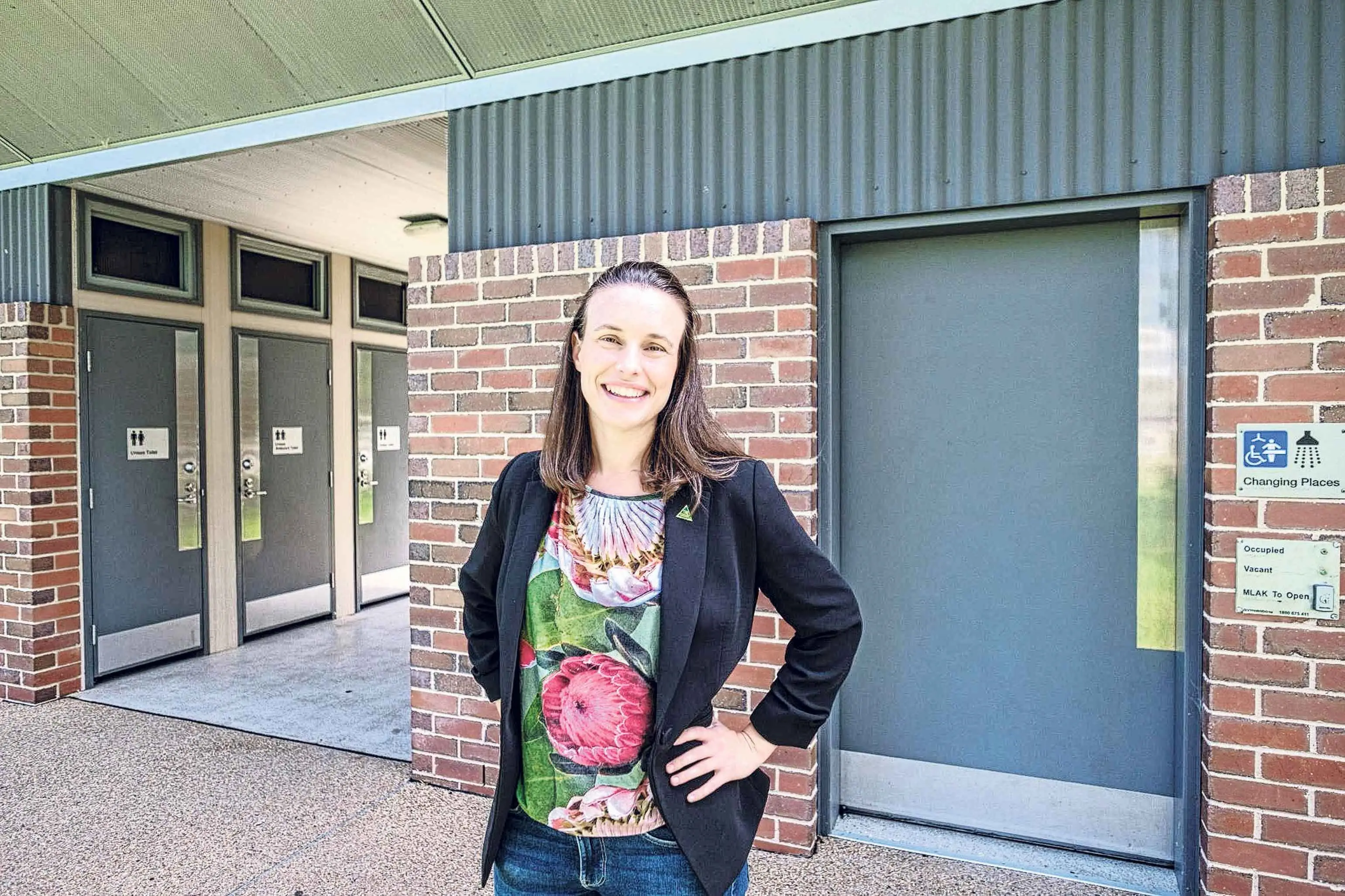 <p>Public toilet inquiry chair Dr Amanda Cohn MLC in front of a toilet block in Albury. She was involved in their upgrade when she was on the local council. Photo: Supplied</p>\\n