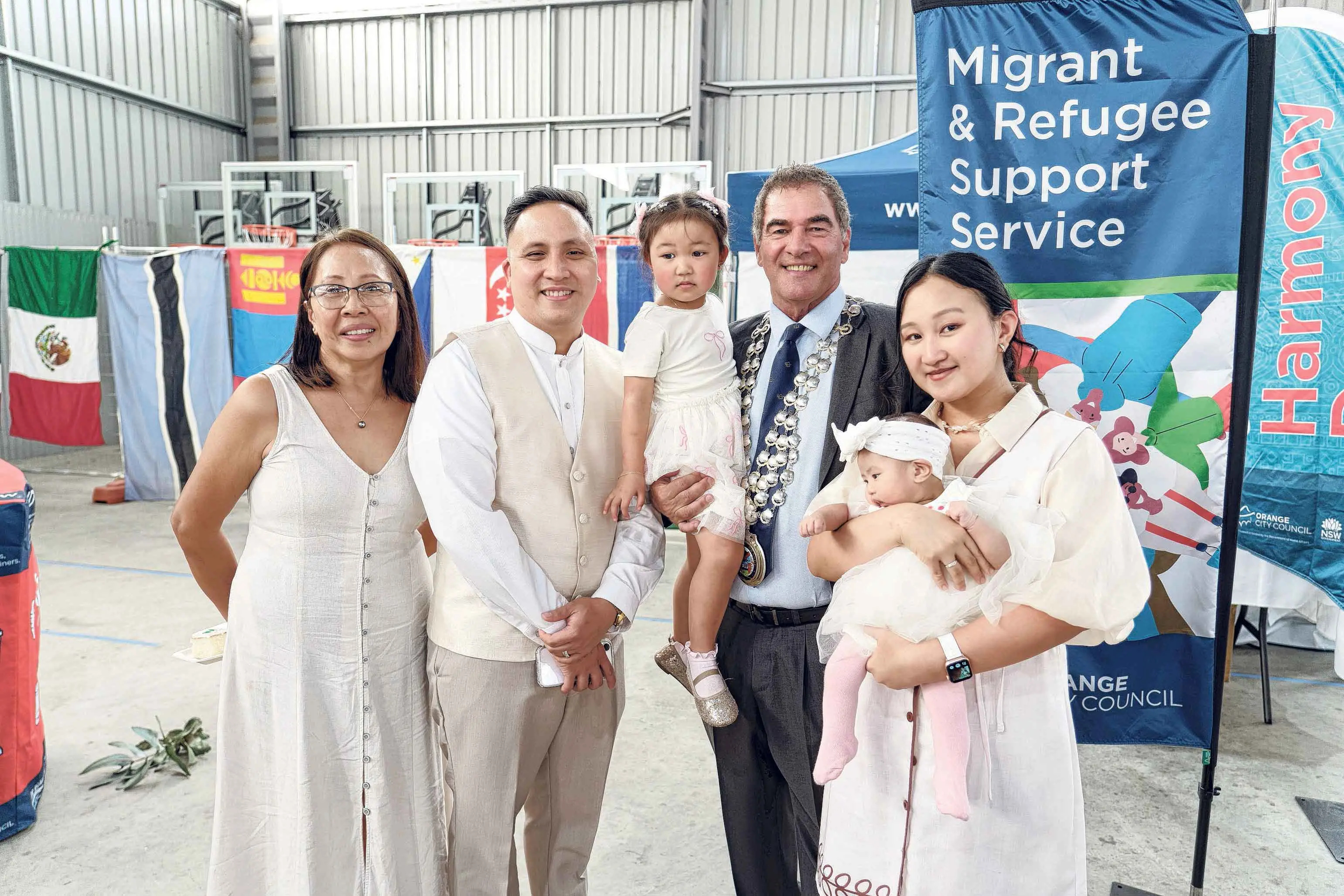<p>Mayor Tony Mileto with Nelly Tuliao and Samuel, Lilac, Magnolia and Xyrize Gabas. Photo: Orange City Life. </p>\\n