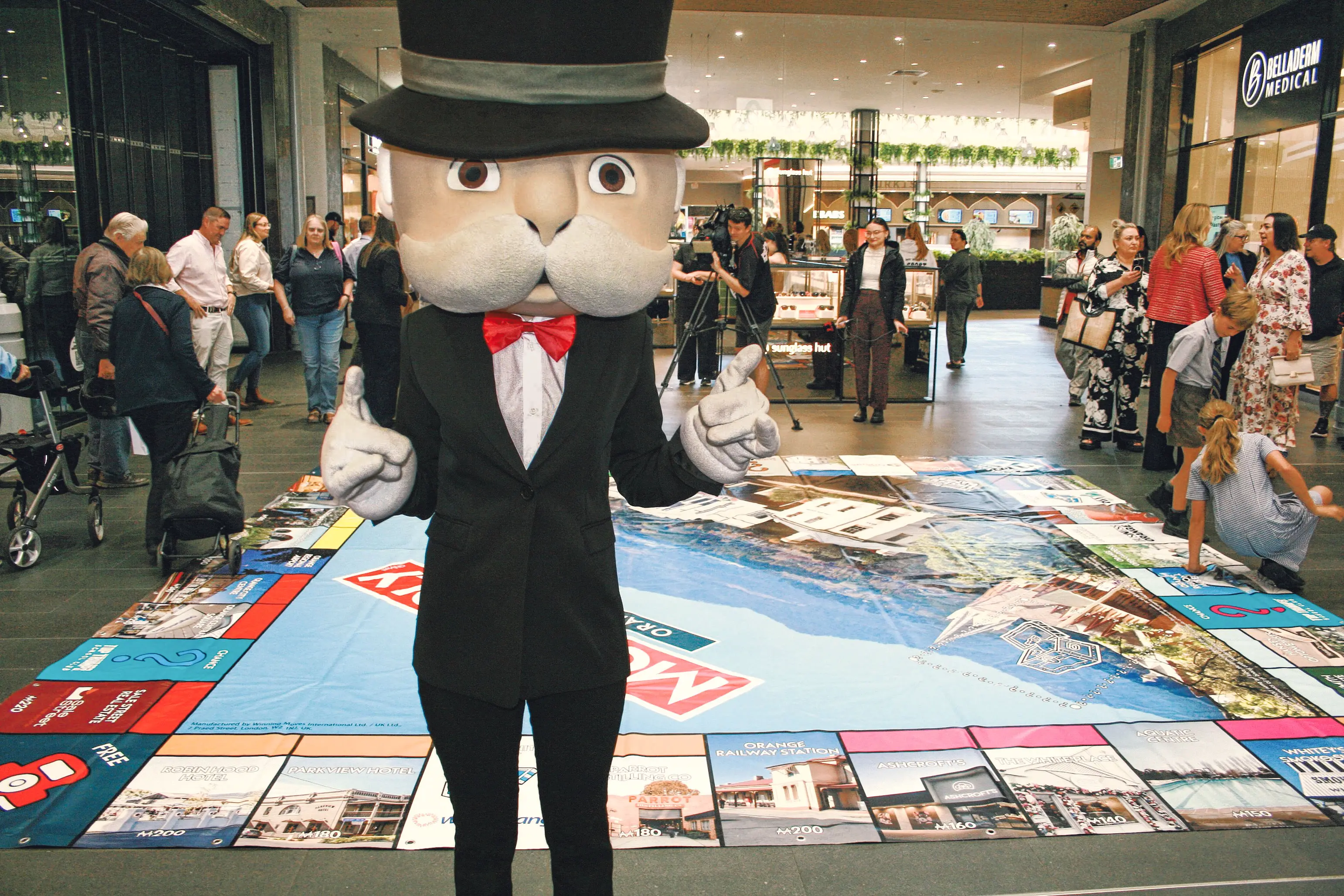<p>\\u201CRich Uncle Pennybags\\u201D or, as he is officially now known, \\u201CMr Monopoly\\u201D gives his approval to the new Colour City edition of the iconic board game. Photo: Orange City Life</p>\\n