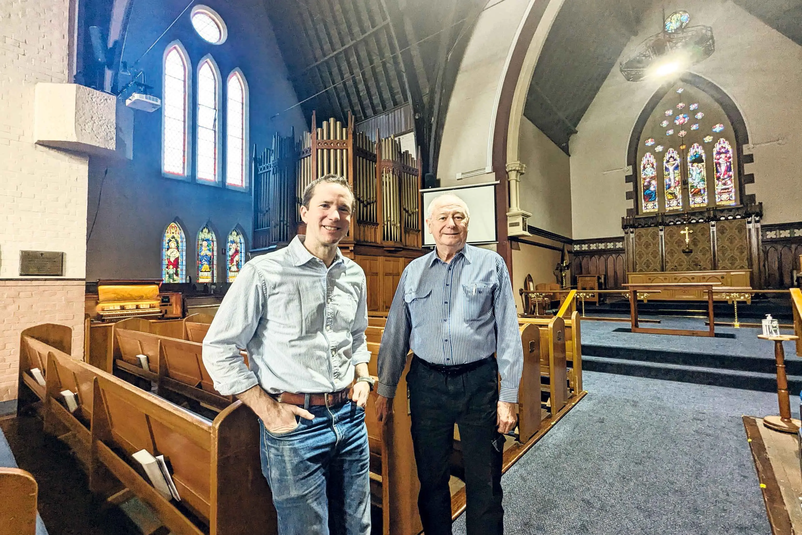 <p> Holy Trinity Church Rector, Rev Andy Martin and Trinity Foundation secretary Ernest Sprave inside the grand 146-year-old church.</p>\\n