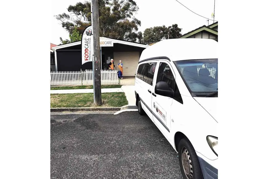 <p>The Live Better shuttle bus in front of FoodCare recently; the food bank is now after a benefactor to replace this vital service. Photo: Supplied.</p>\\n