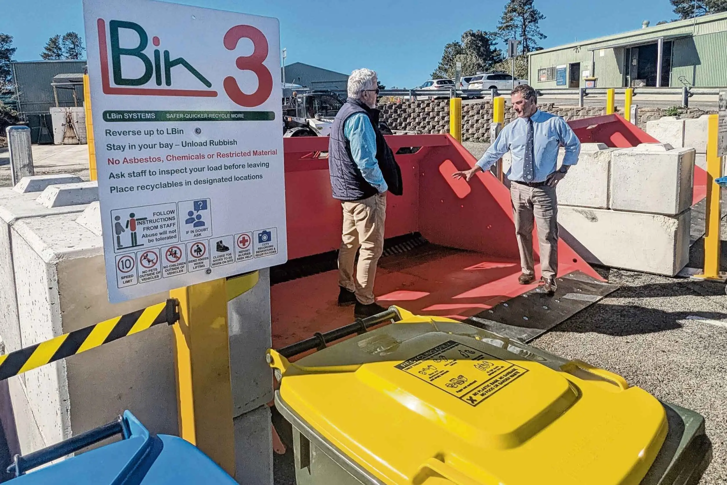 <p>Managing Director of Contained Waste Solutions, Jason Lacey, talks though the new LBin waste system with Orange Mayor Tony Mileto.</p>\\n