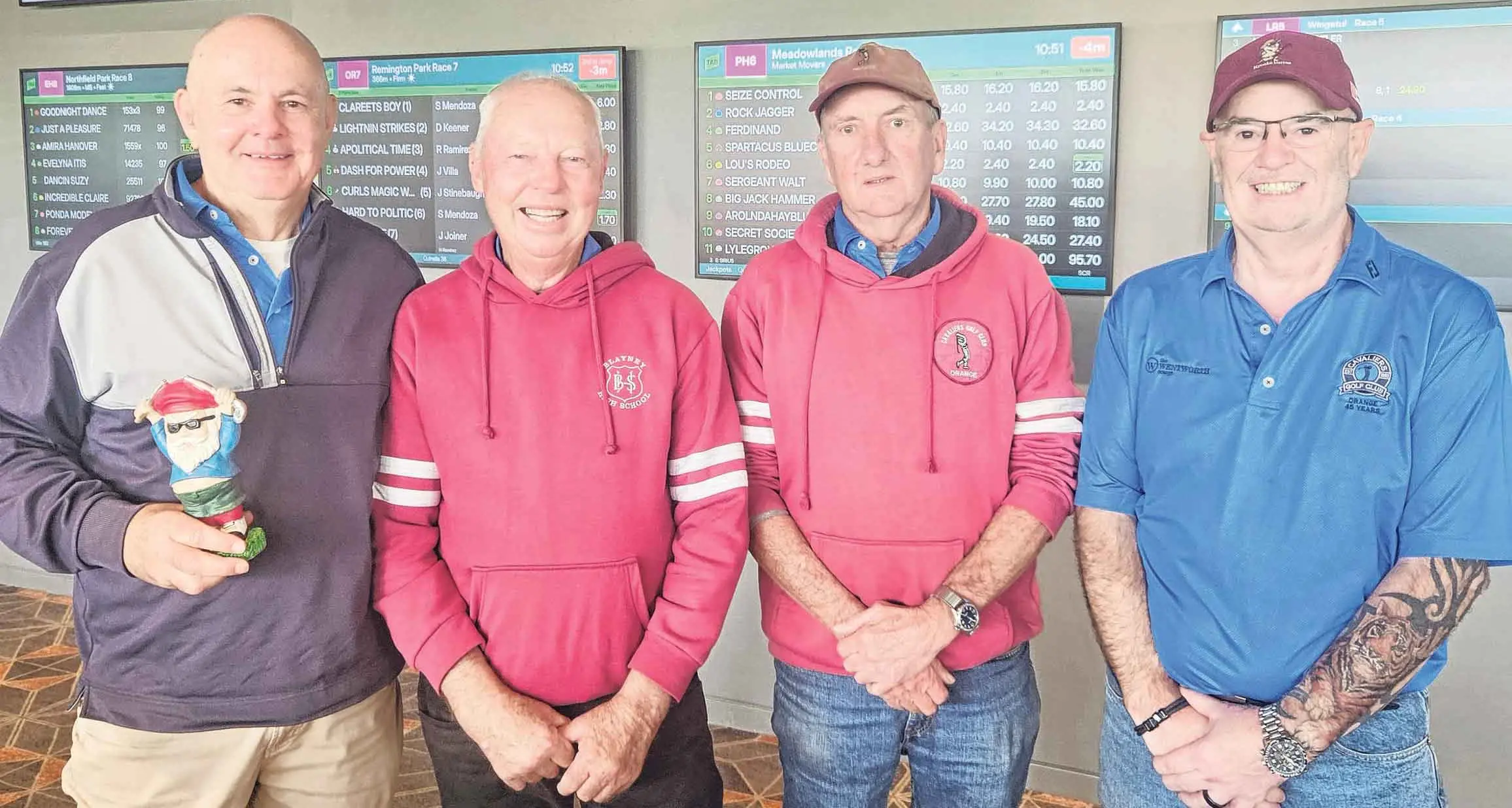 Wal Hennessy wins in rain-drenched golf competition