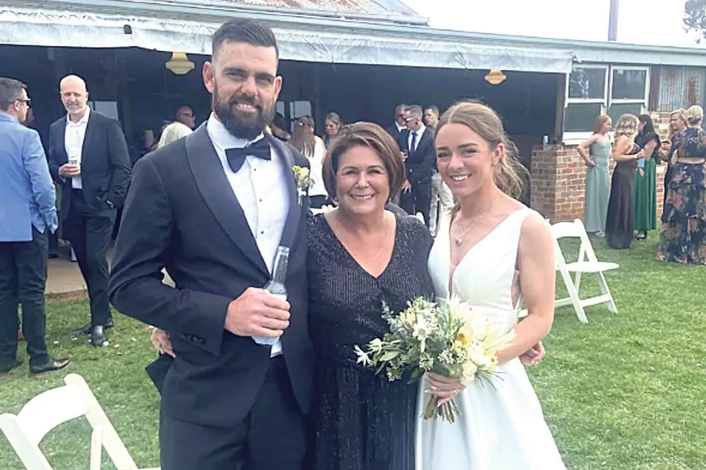 <p>Local marriage celebrant Donna Susan Sharp (centre) also offers to make that very special wedding cake that you\\u2019ll remember long after your reception. Photo: Supplied</p>\\n