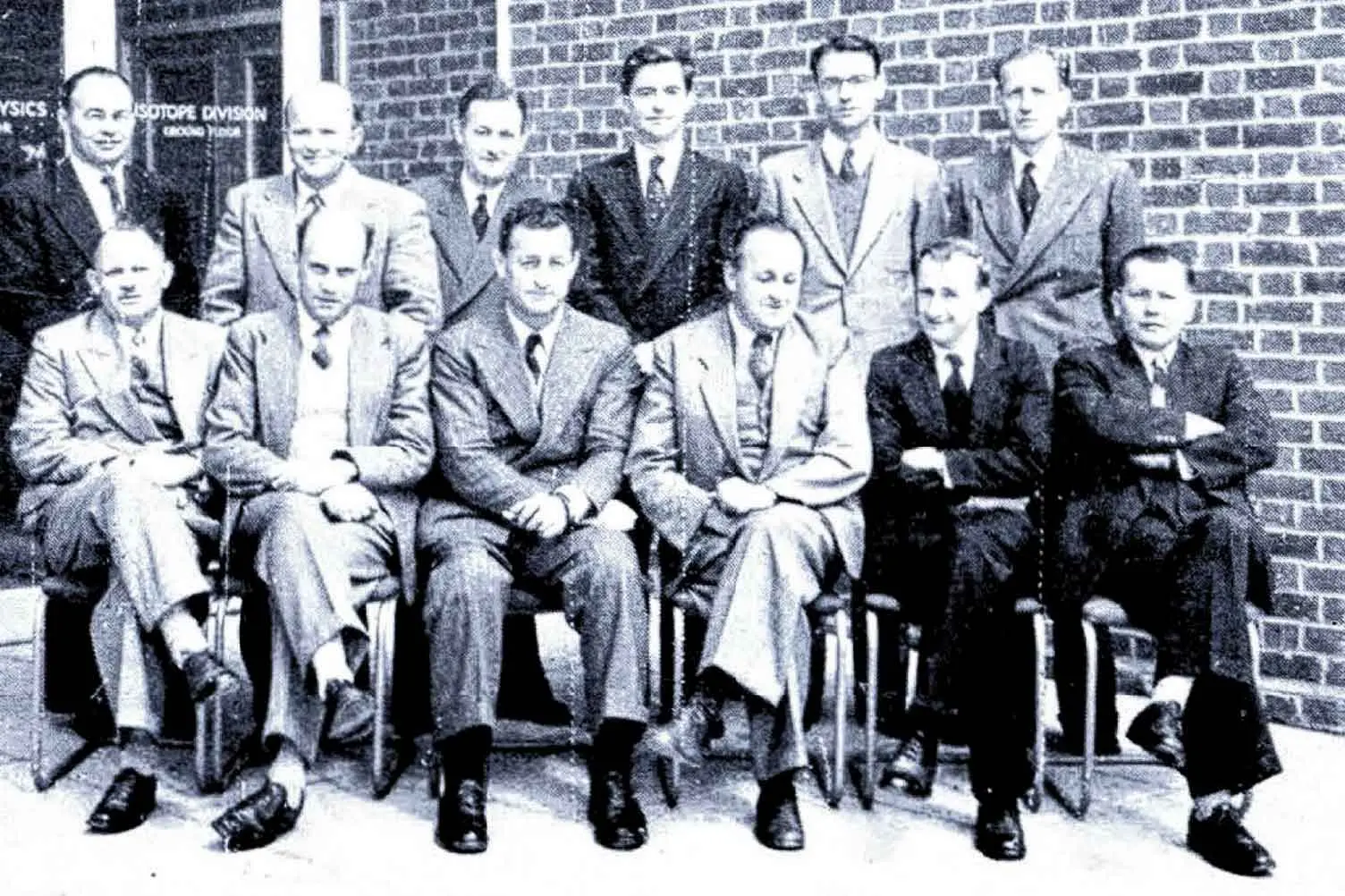 <p>Dr Owen Pulley (back row at right) was in England as the first Australian Atomic Energy Commission Liaison Officer in 1956. Photo: Australian Atomic Energy Commission.</p>\\n