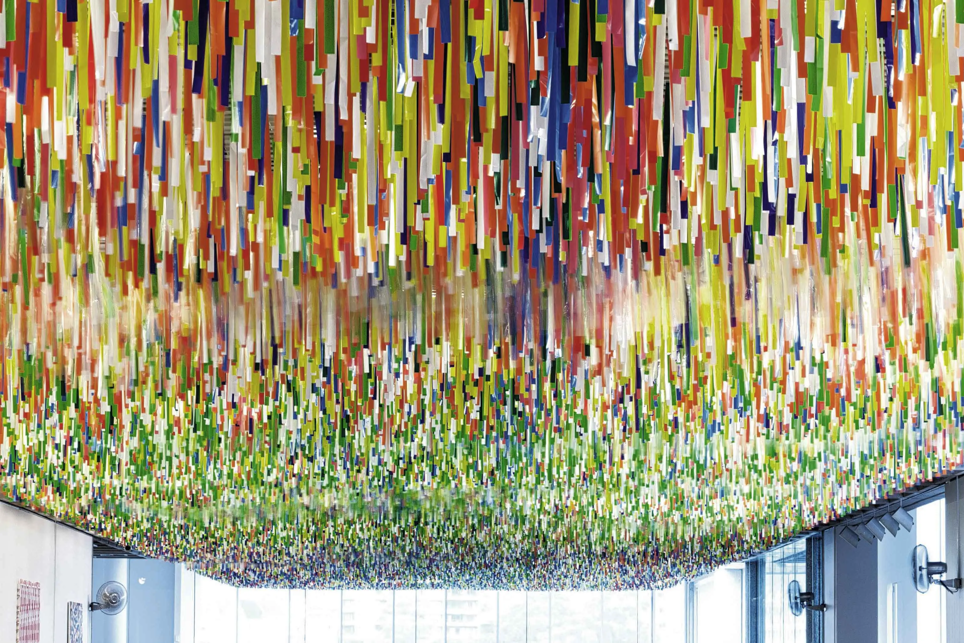 <p>Nike Savvas, \\'Rally\\' 2014, plastic bunting, wire rigging, electric fans. Art Gallery of New South Wales. Photo: Jamie North.</p>\\n