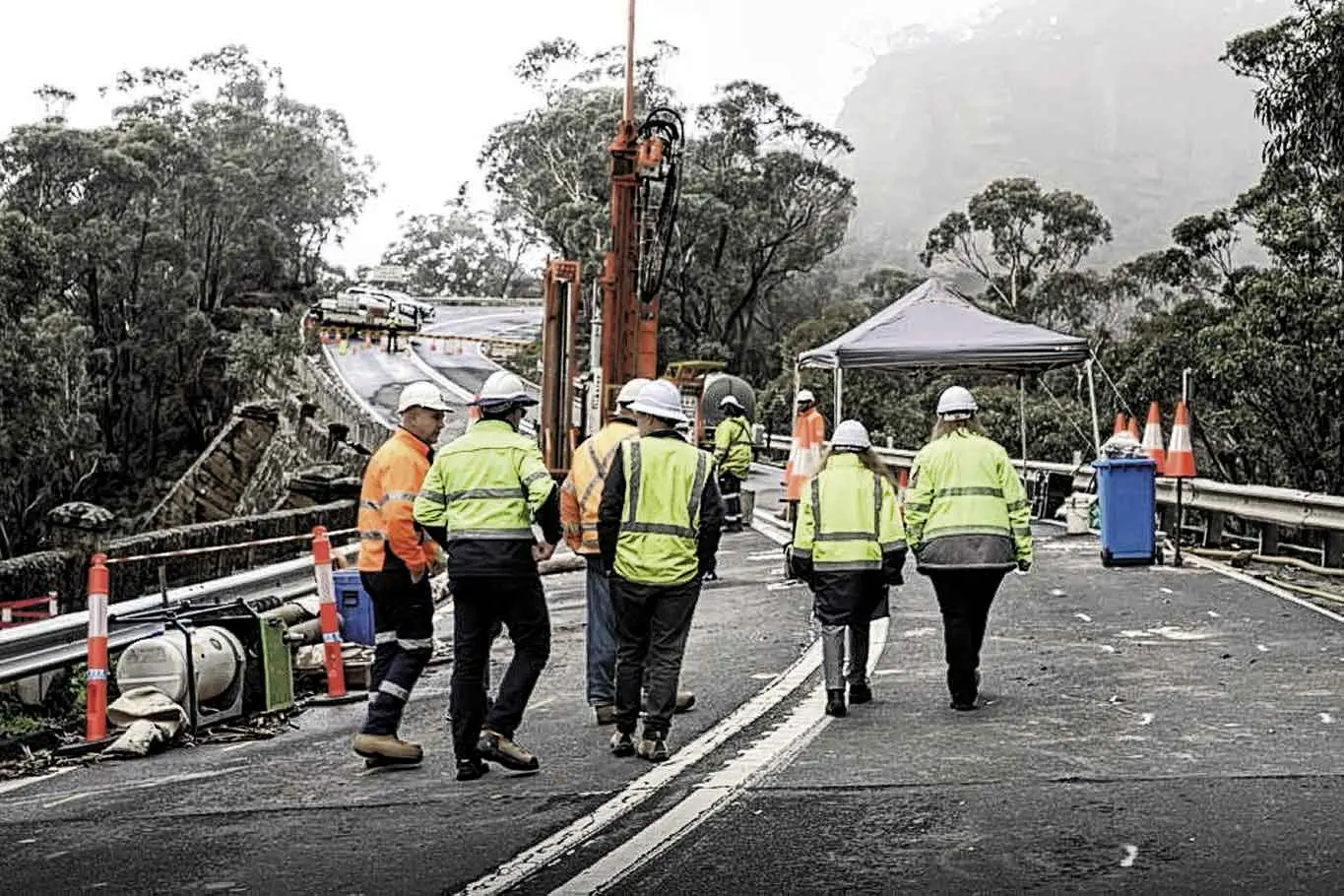 <p> NSW Minister for Roads Jenny Aitchison inspects the damaged Mitchells Causeway at Victoria Pass. Photo: Supplied. </p>\\n