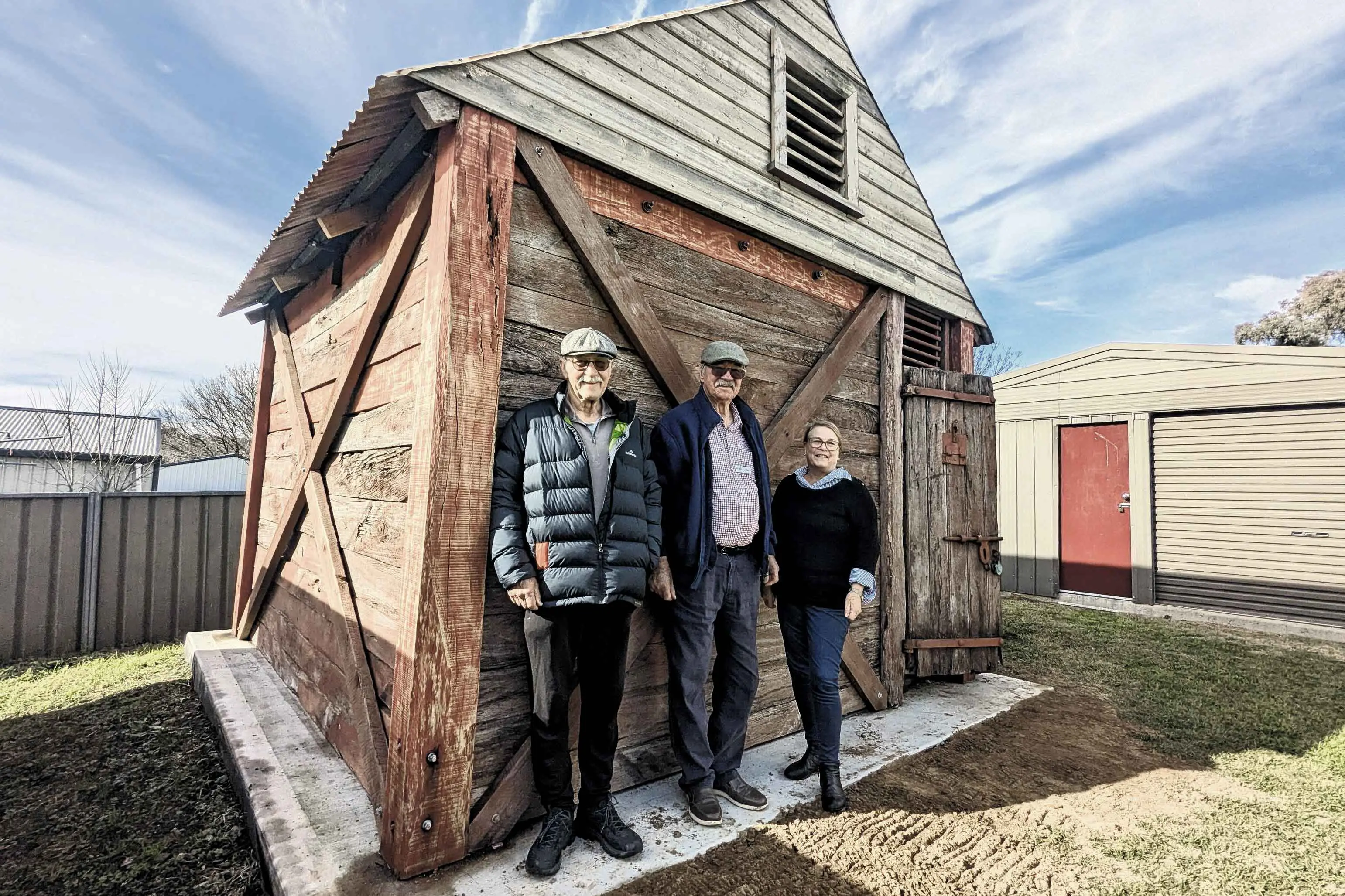<p>Cameron Wild, John Lawrie and Julie Lawrie with the rebuilt historic police lock-up.</p>\\n