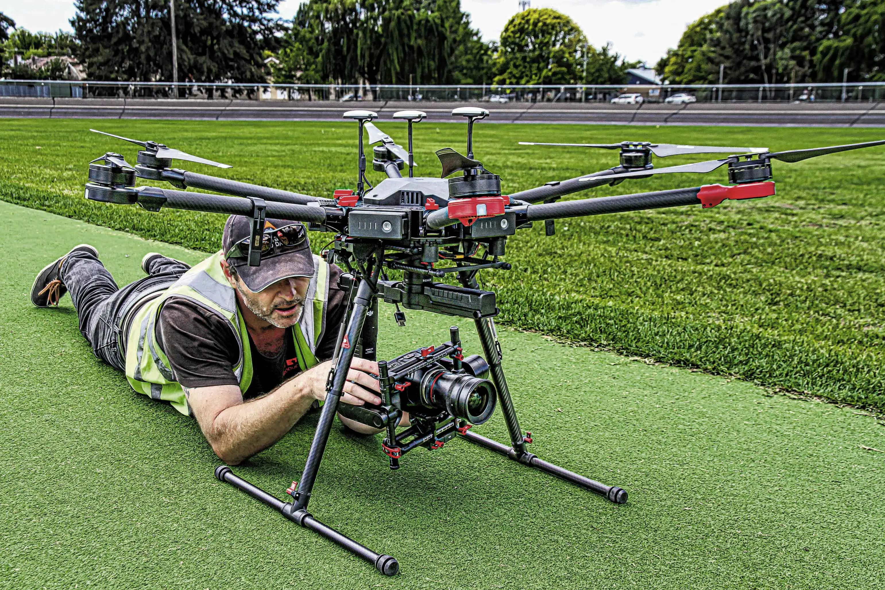 <p>Troy Pearson getting his drone ready for a flight in Moulder Park.</p>\\n