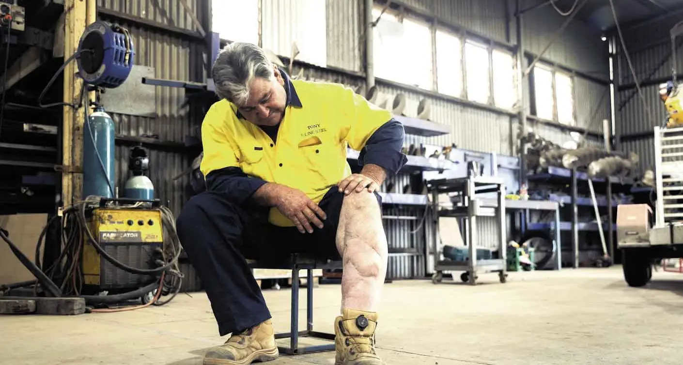 Pinned under a 15-tonne truck, Tony thought it was over. Then the Flying Doctor came...