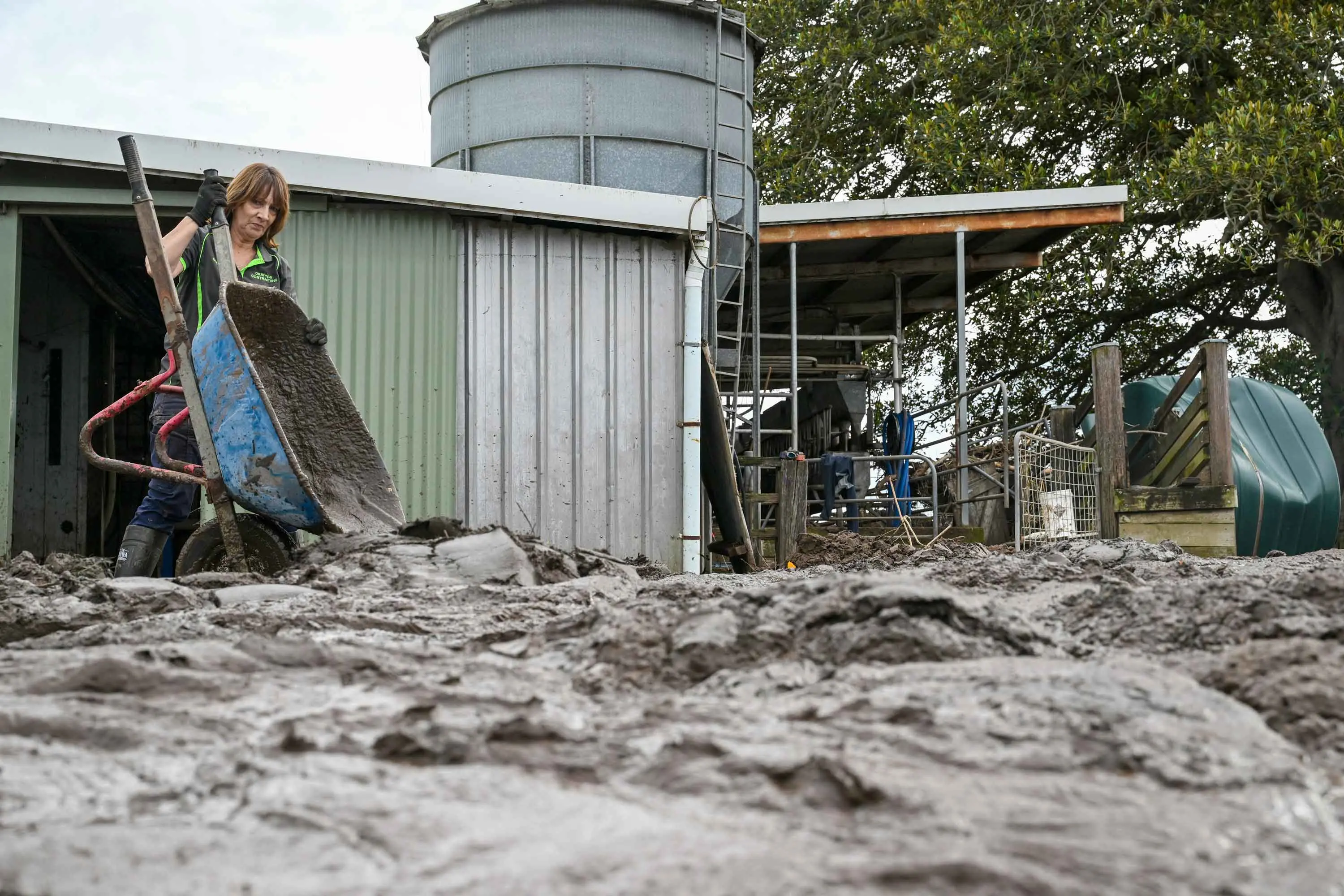 <p>More than 90 per cent of farmers have been affected by natural disasters in the past five years. Pictured is one of the many people who were part of a massive clean-up effort in the flood-effected region of Taree in May, 2025. Photo: AAP/Dean Lewins</p>\\n