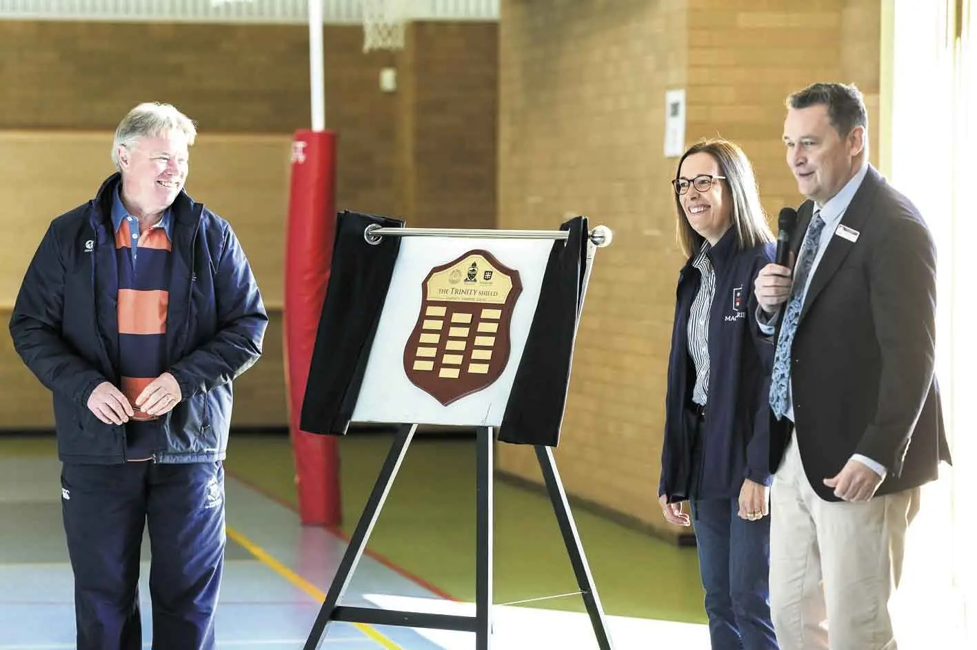 <p>Leaders of the three schools with the Trinity Shield. Photo: Supplied. </p>\\n