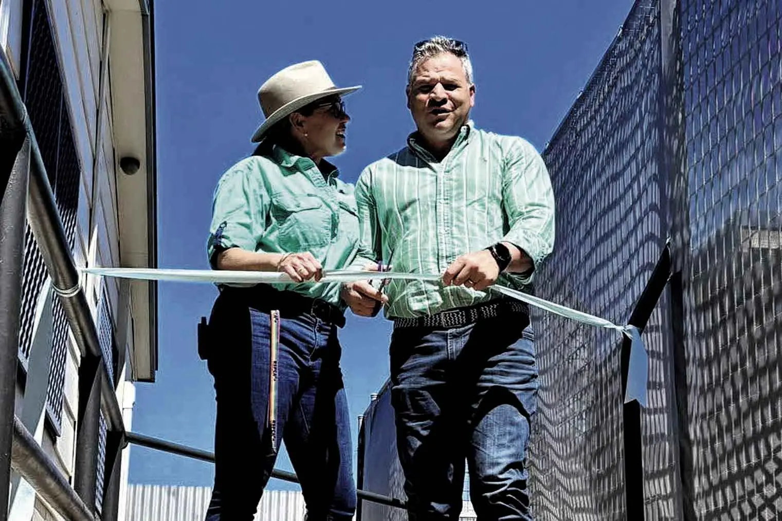<p>Diesel & Blue owner Danielle Haase with Member for Orange Phil Donato cutting the ribbon to officially open the spacious new Diesel & Blue Dog Retreat. Photo: Supplied. </p>\\n